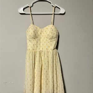 No Boundaries Pale Yellow Spaghetti Strap Mini Dress with Gold Accents